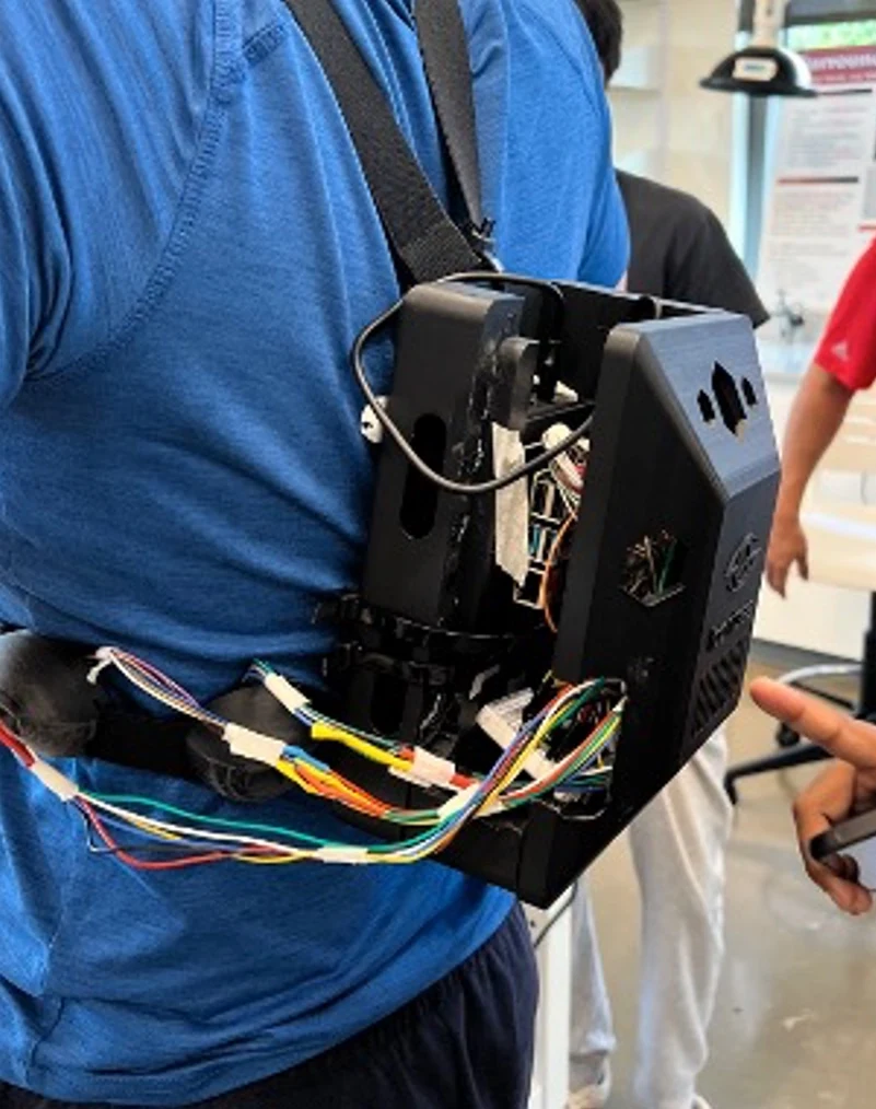 Side view of the SafeStride prototype showing its electronics and wiring