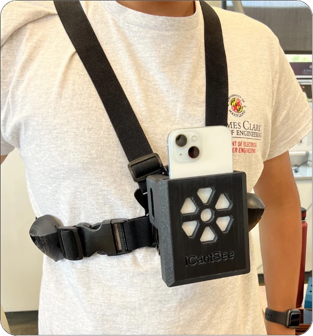 SafeStride chest strap with a phone mounted above the sensor enclosure